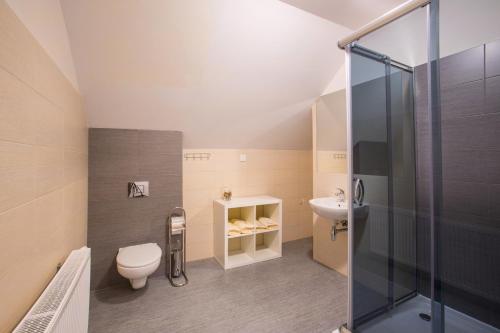 Kylpyhuone majoituspaikassa Nowe Apartamenty CMK