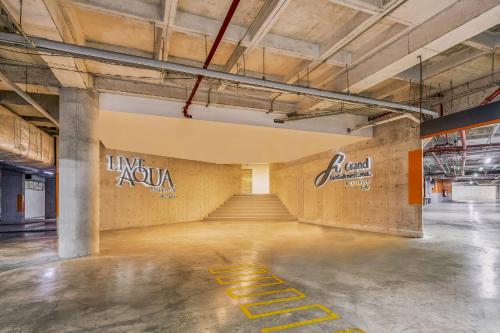 a room with graffiti on the wall of a building at Live Aqua Monterrey in Monterrey