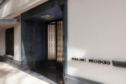 a building with a sign that reads miami photography at Hotel Edificio Republica in Mexico City
