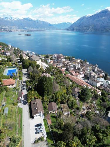 an aerial view of a town next to a body of water at Lake Star in Brissago