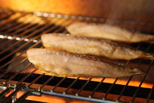 two pieces of food cooking in an oven at Hanashibuki in Tateyama