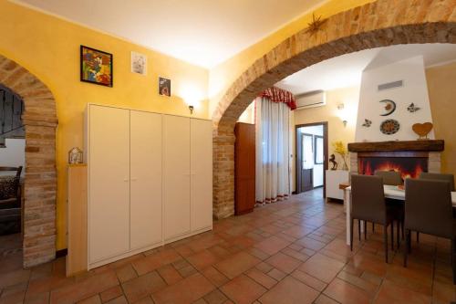 a living room with a table and a fireplace at cs veniceflat Apartment - Venice - Apt Vce - 15' from Venice in Tessera