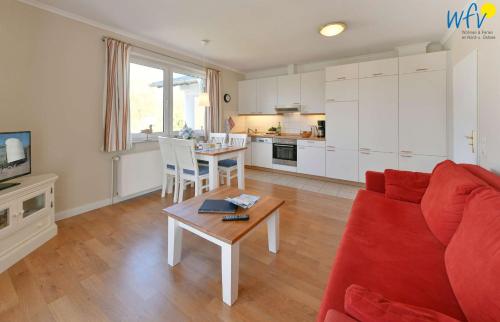 Køkken eller tekøkken på Haus am Hövt - Ferienwohnung 8