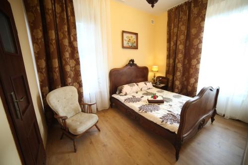 Cama o camas de una habitación en Willa Podzamcze