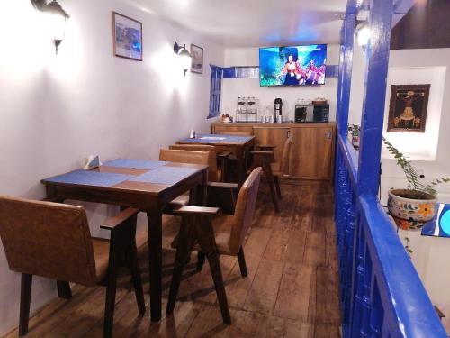 TV a/nebo společenská místnost v ubytování El Ave Azul Boutique Hotel Cusco