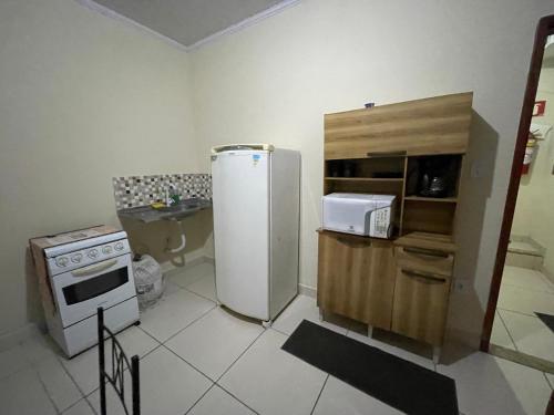 Η κουζίνα ή μικρή κουζίνα στο Tavares casa 1