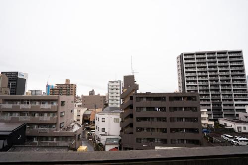 Pemandangan umum bagi Minami-sotoborichō atau pemandangan bandar yang diambil dari apartmen