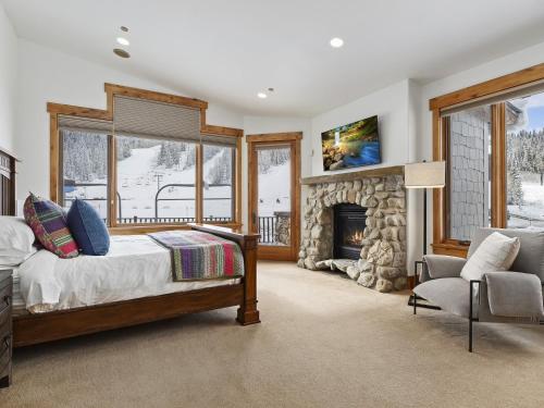 a bedroom with a bed and a fireplace at Apex Lodge SOL-12011 in Salt Lake City