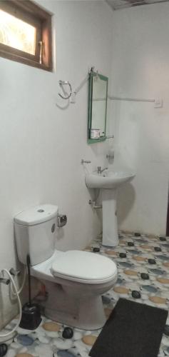 Koupelna v ubytování Himansa Homestay