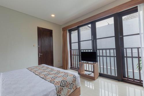 Katil atau katil-katil dalam bilik di The BALIem Villa