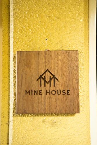 a wooden sign on the side of a mine house at N262walk 3 minutes to Osu shopping street stay 8 people in Aoichō