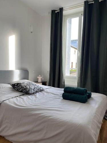 Krevet ili kreveti u jedinici u okviru objekta Lovely bright apartment near Paris - Bercy - Orly - Rungis