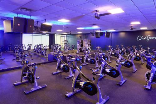 a gym with a lot of exercise bikes in it at Renaissance ClubSport Aliso Viejo Laguna Beach Hotel in Aliso Viejo
