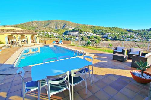 Photo de la galerie de l'établissement Marquesol - pri. pool villa with captivating hill views in Benitachell, à Benitachell