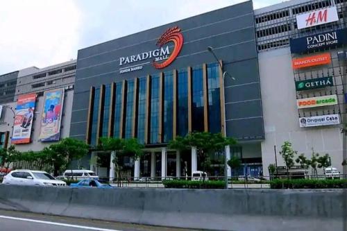 a parking lot in front of a panda hospital at Bench/seaviews4-13pax/JohorBahru 9B amberside in Johor Bahru