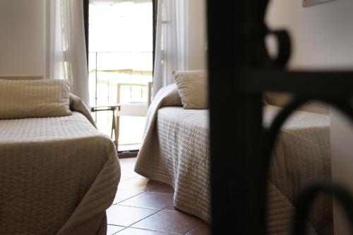 Da Baranin B&B and Apartmentにあるベッド