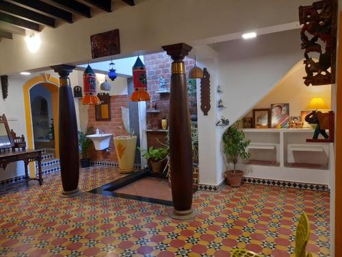 Postel nebo postele na pokoji v ubytování Paradise Heritage Villa