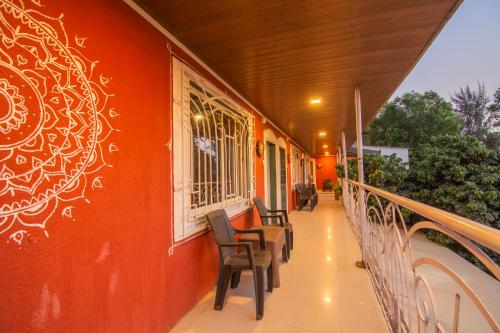 Un balcón o terraza en Flora Ecostay Resort and Spa Lonavala