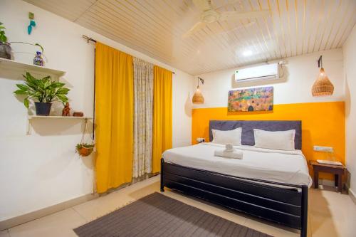 Postel nebo postele na pokoji v ubytování Flora Ecostay Resort and Spa Lonavala