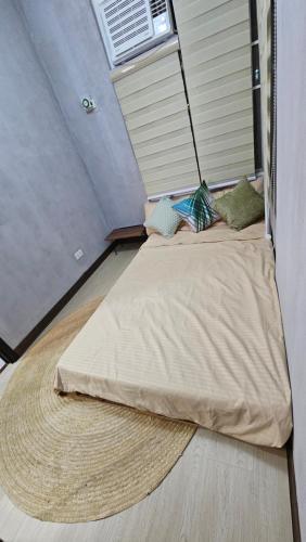 מיטה או מיטות בחדר ב-Serene Escape: Near BGC & NAIA
