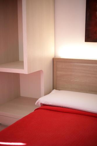 Ένα ή περισσότερα κρεβάτια σε δωμάτιο στο BlueBay Residence Resort