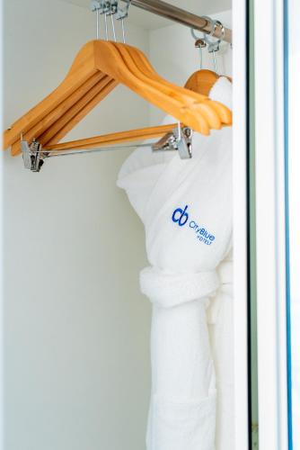 a closet with a rack of underwear and towels at Urban by CityBlue Hotel, Dar es Salaam in Dar es Salaam