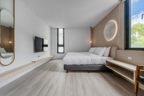 Ein Bett oder Betten in einem Zimmer der Unterkunft Moda & the Moon B&B
