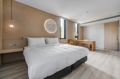 Ein Bett oder Betten in einem Zimmer der Unterkunft Moda & the Moon B&B