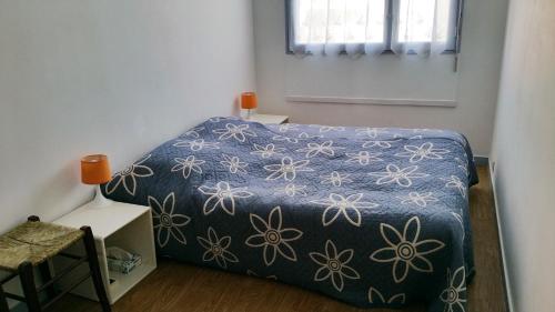 Giường trong phòng chung tại Appartement charmant centre ville