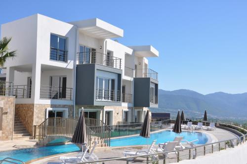 a view of a villa with a swimming pool at Lavender Residence in Kuşadası