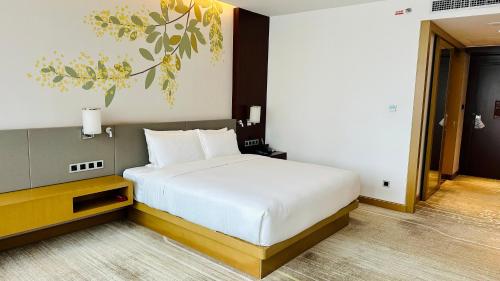 Letto o letti in una camera di Hilton Garden Inn Foshan