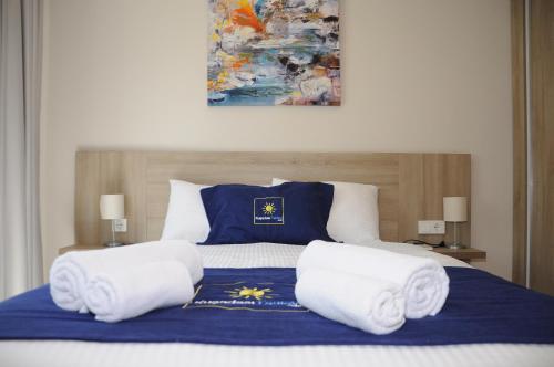Ένα ή περισσότερα κρεβάτια σε δωμάτιο στο Lavender Residence