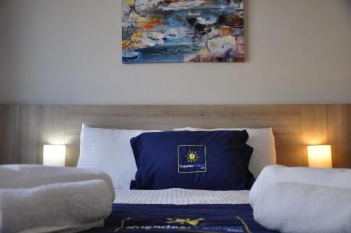 Ένα ή περισσότερα κρεβάτια σε δωμάτιο στο Lavender Residence