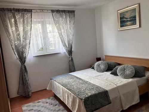 Postel nebo postele na pokoji v ubytování App Martina