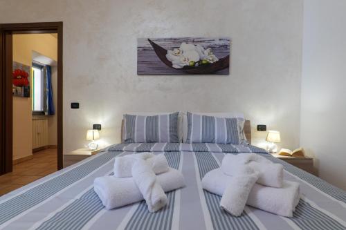 Ένα ή περισσότερα κρεβάτια σε δωμάτιο στο Appartamento Gloria