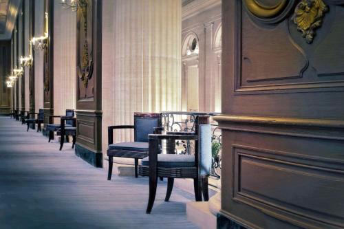 a row of chairs lined up in a hallway at Hilton Chicago in Chicago