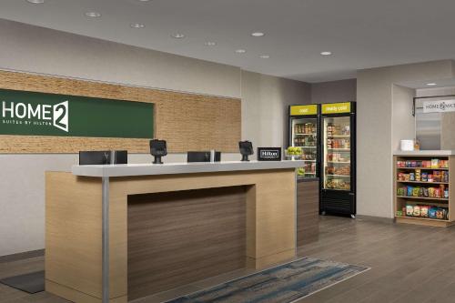 a store lobby with a counter in a store at Home2 Suites By Hilton Abilene Southwest in Abilene