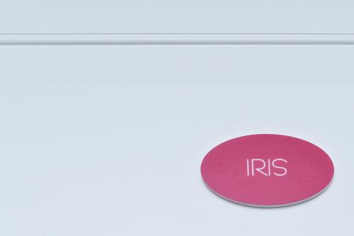 a pink circle with the word irs on it at Edahouse in Salerno