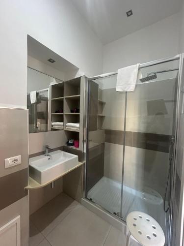 a bathroom with a shower and a sink at Amarillo in Palermo