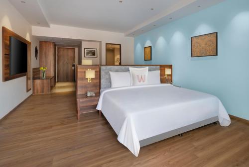 Postel nebo postele na pokoji v ubytování Welcomhotel By ITC Hotels, Belagavi