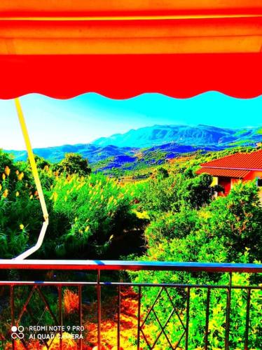 a view of the mountains from a balcony at The best view in Zakharo