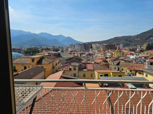 a view of a city with buildings and mountains at B&B dei Rota Affittacamere Mercato San Severino Salerno in Mercato San Severino