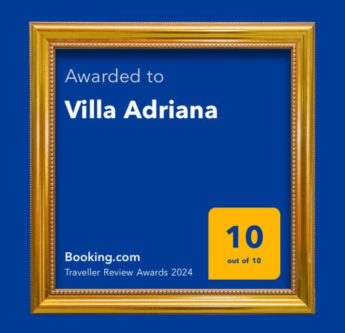 a gold picture frame with the words awarded to villa adelaide at Villa Adriana in Vetralla