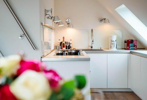 Kuchyň nebo kuchyňský kout v ubytování Ferienwohnung Seefeder