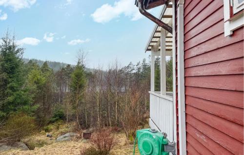 a view from the side of a red house at Amazing Home In Hrryda With Sauna in Härryda