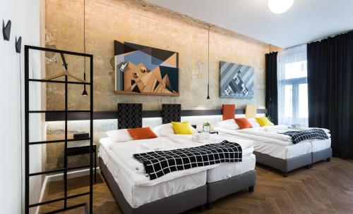 Postel nebo postele na pokoji v ubytování Lublaňská 12