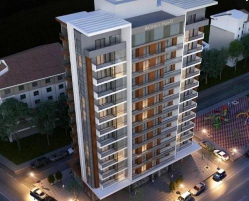 an artist rendering of a tall white building at فندق السعاده in ‘Izbat Hud.hud