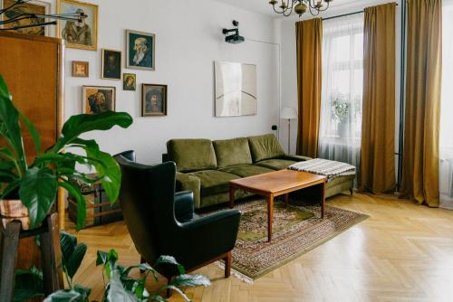 a living room with a couch and a table at 4ry pokoje in Cieszyn