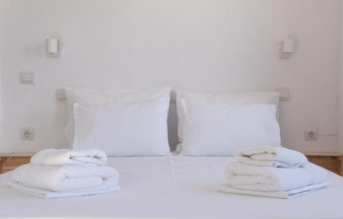 Ένα ή περισσότερα κρεβάτια σε δωμάτιο στο The Botanist Guesthouse