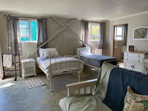 Ένα ή περισσότερα κρεβάτια σε δωμάτιο στο The Bed in the Shed